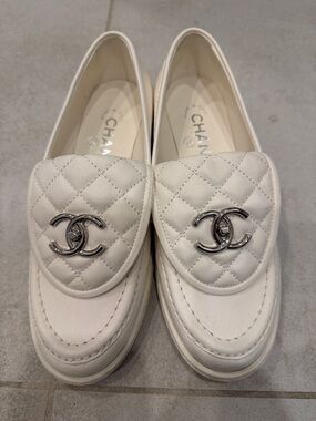 CHANEL Ivory Quilted Leather Loafers with Silver CC Emblem
